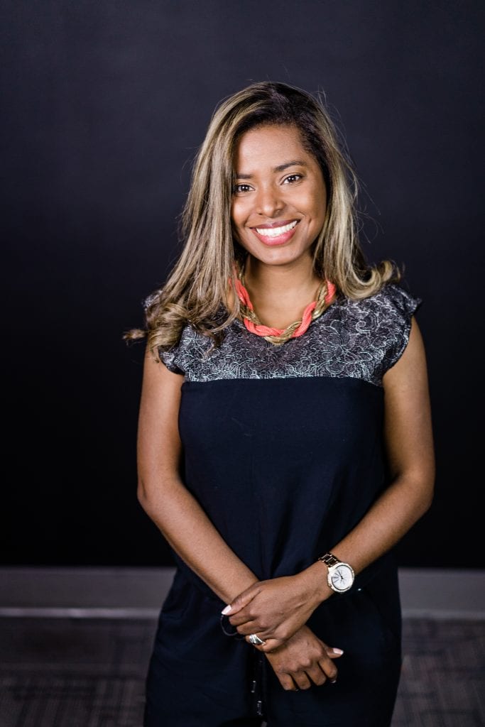 Meet the team smiling woman in dark dress